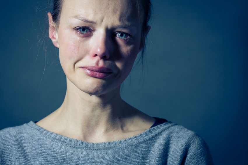 Woman crying.