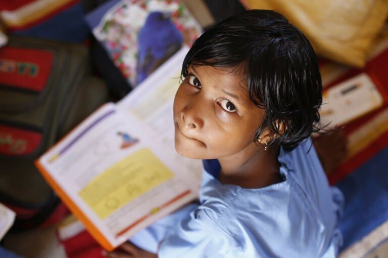 Child learning from book