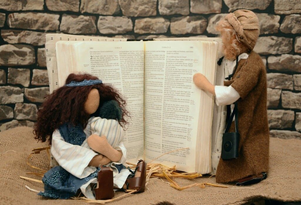 Book with text and dolls