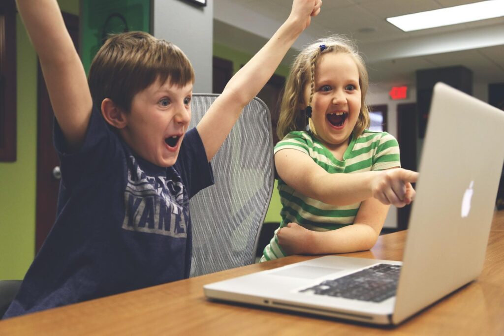 Children enjoying computer games