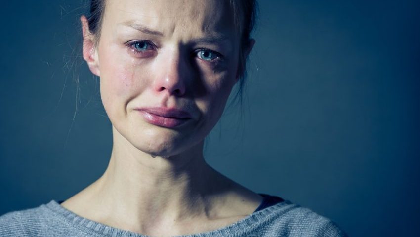 Woman crying.